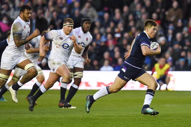 Huw Jones shows England a clean pair of heels as he scores his second try in the 25-13 Calcutta Cup win in 2018.