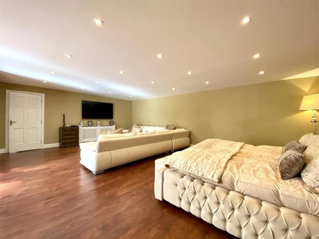 Lower level study/lounge or additional bedroom.