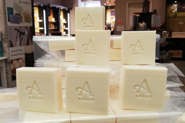 Around 500 bars of the soap still remain  with the company now to distribute them to those who need them. PIC: Contributed.