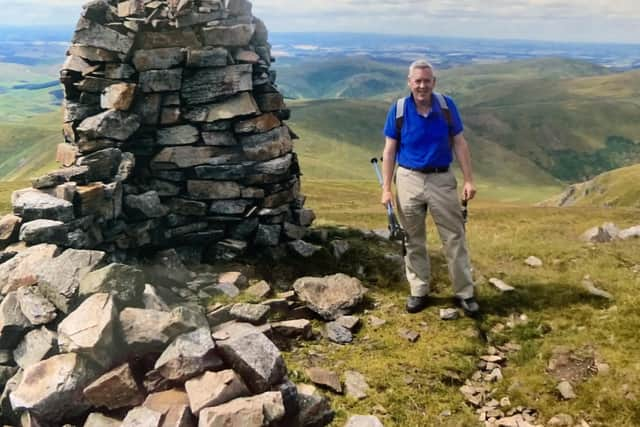 Fordyce Maxwell on top of Cheviot in Northumberland