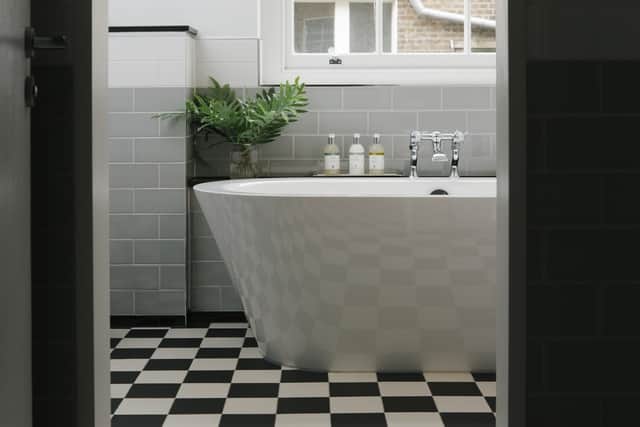 Classy and cool, one of the ensuite bathrooms. Pic: Contributed