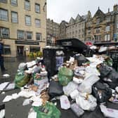 Overflowing bins in the Grassmarket area of Edinburgh where cleansing workers from the City of Edinburgh Council are on the fourth day of eleven days of strike action.