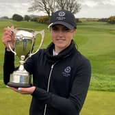 Royal Norwich player Chloe Tarbard shows off the trophy after winning the Scottish Girls' Open at Powfoot. Picture: Scottish Golf