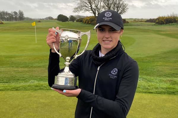 Royal Norwich player Chloe Tarbard shows off the trophy after winning the Scottish Girls' Open at Powfoot. Picture: Scottish Golf