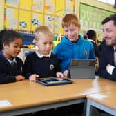 Edinburgh Council Leader Cammy Day visits Carrick Knowe Primary School, where pupils have benefited from a local authority scheme to distribute digital devices. Image: Stewart Attwood Photography 2023.