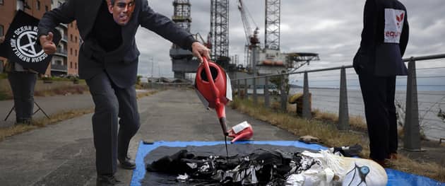 Protesters from Ocean Rebellion demonstrate next to an oil platform on the banks of the river Tay, calling for a halt to plans to open the giant Rosebank oil field, off Shetland, which could yield up to 500 million barrels of oil. Picture: Jeff J Mitchell/Getty Images