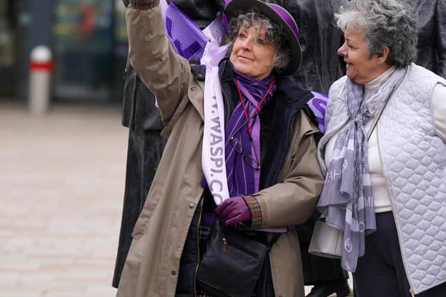 Campaigners for Women Against State Pension Inequality Campaign (Waspis) gather at the statue of political activist Mary Barbour, the woman who led rent strikes during the First World War, in Govan, Glasgow.