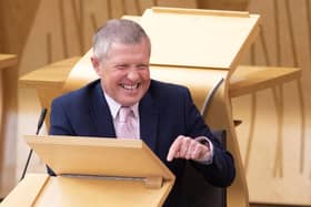 Willie Rennie criticised Scottish Government spending on cutting up doors.