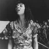 Irene Cara as Coco Hernandez performing at a graduation ceremony in a scene from Fame (Picture: United Artists/Archive Photos/Getty Images)