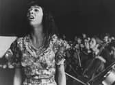 Irene Cara as Coco Hernandez performing at a graduation ceremony in a scene from Fame (Picture: United Artists/Archive Photos/Getty Images)