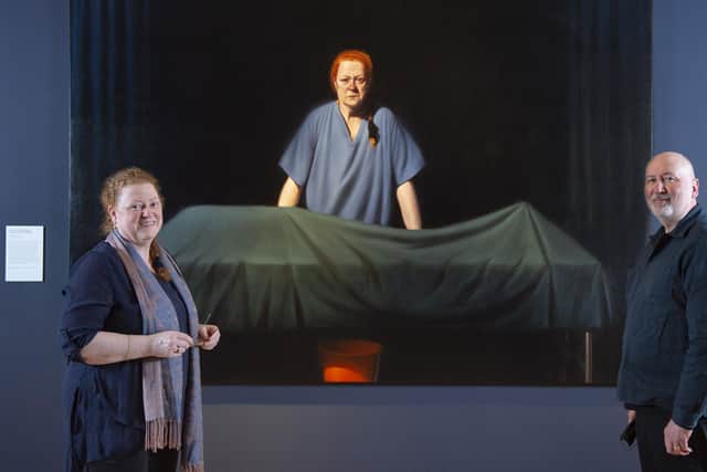 Professor Dame Sue Black and artist Ken Currie in front of Currie's new portrait, Unknown Man (2019), of which Professor Black is the subject.