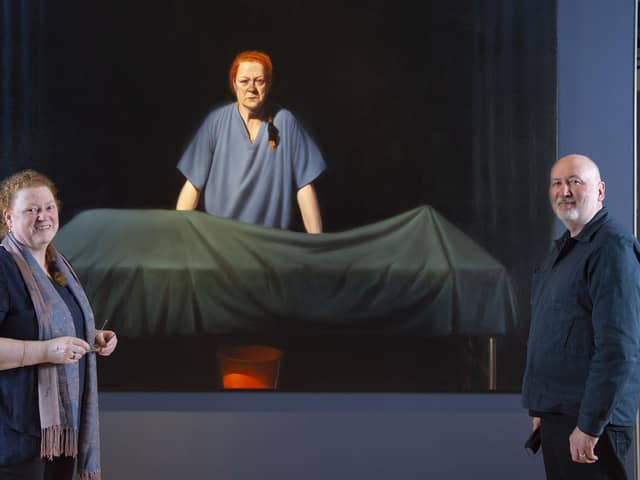 Professor Dame Sue Black and artist Ken Currie in front of Currie's new portrait, Unknown Man (2019), of which Professor Black is the subject.