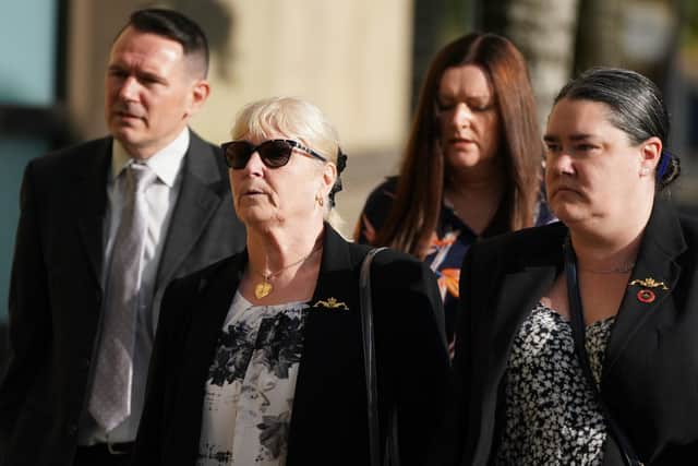 The widow of Tony Parsons, Margaret Parsons (front centre) arrives at the High Court, Glasgow, with their son and daughter, Mike and Victoria (right), for the sentence hearing of the McKellar brothers. Picture: Andrew Milligan/PA Wire
