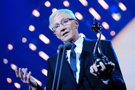 Paul O'Grady collecting the best Factual Entertainment programme award on stage during the 2014 National Television Awards at the O2 Arena, London.