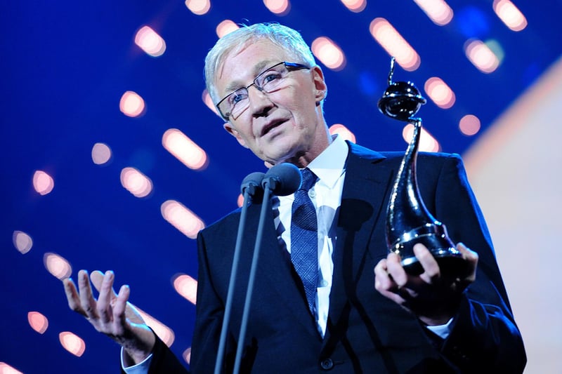 Paul O'Grady collecting the best Factual Entertainment programme award on stage during the 2014 National Television Awards at the O2 Arena, London.