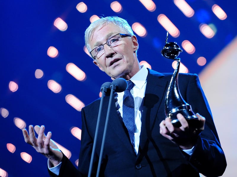 Paul O'Grady collecting the best Factual Entertainment programme award on stage during the 2014 National Television Awards at the O2 Arena, London.