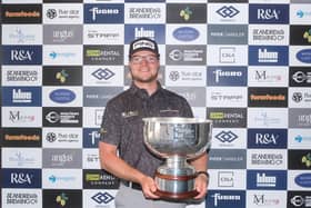Rhys Thompson shows off the trophy after his play-off win in the Dundonald Links Classic presented by Murray Capital. Picture: Tartan Pro Tour