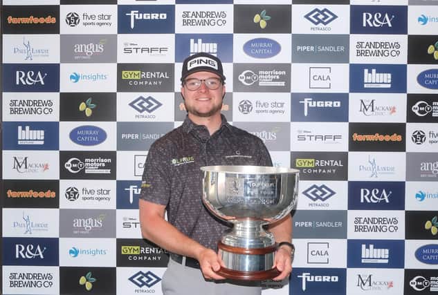 Rhys Thompson shows off the trophy after his play-off win in the Dundonald Links Classic presented by Murray Capital. Picture: Tartan Pro Tour