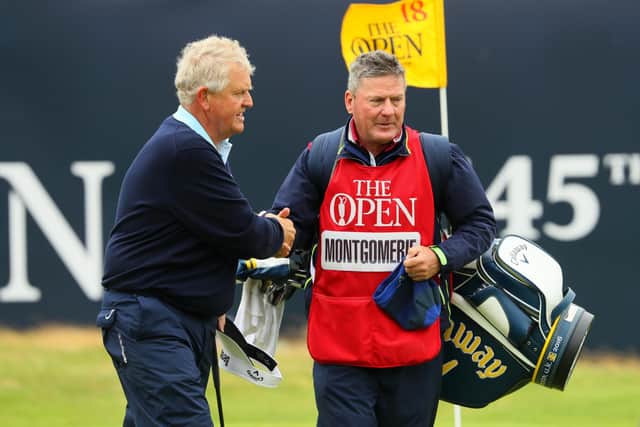 Colin Montgomerie shakes hands with caddie Alastair McLean after completing the final round in the 145th Open Championship at Royal Troon in 2016. Picture: Andrew Redington/Getty Images.