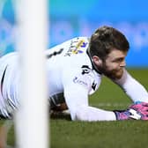 Goalkeeper Zander Clark is struggling with injury for St Johnstone.