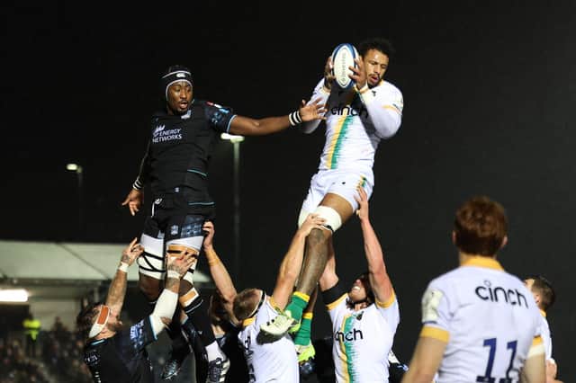 Northampton's Courtney Lawes wins a lineout against Glasgow Warriors' Sintu Manjezi during the Investec Champions Cup match at Scotstoun Stadium. (Photo by Ross MacDonald / SNS Group)