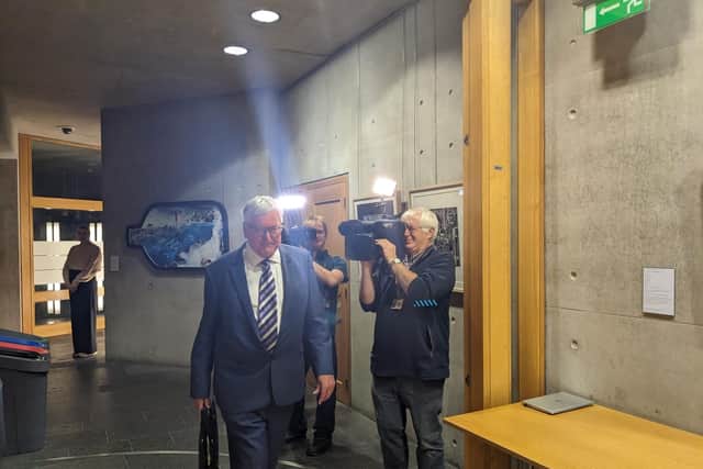 Fergus Ewing heads towards a meeting that resulted in his MSP group issuing the veteran parliamentarian with a one week suspension.