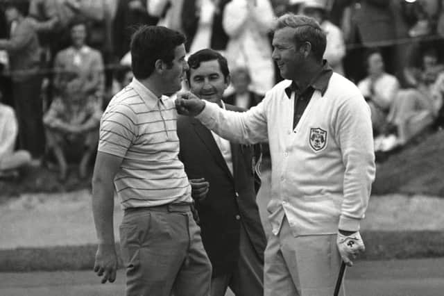 Harry Bannerman gets a friendly tap on the chin from Arnold Palmer after tying with the great American in the singles at the 1972 Ryder Cup at Old Warson Country Club near St Louis. Picture: AP/Shutterstock
