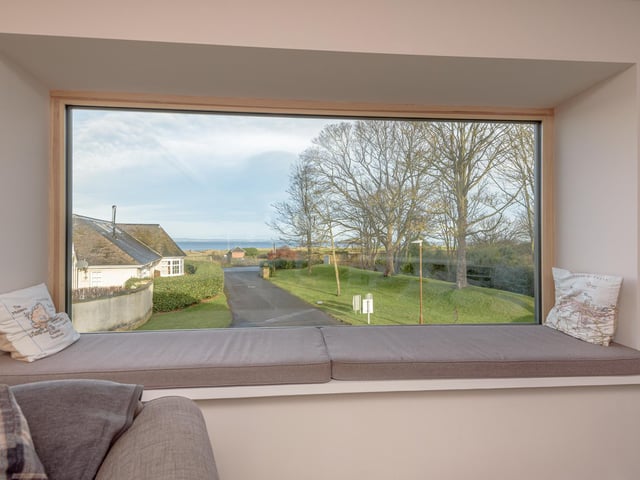 Exterior: Well-maintained gardens include lawns, a seating area, garage and summer house.
Contact: Coulters on 0131-603 7333.