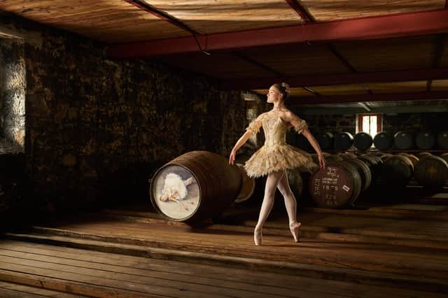 Scottish Ballet dancer Alice Kawalek with The Sleeping Beauty cask.
