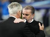 Celtic head coach Ange Postecoglou, right, and Real Madrid's counterpart Carlo Ancelotti greet each other before the start of their Champions League group match at the Bernabeu. (AP Photo/Manu Fernandez)