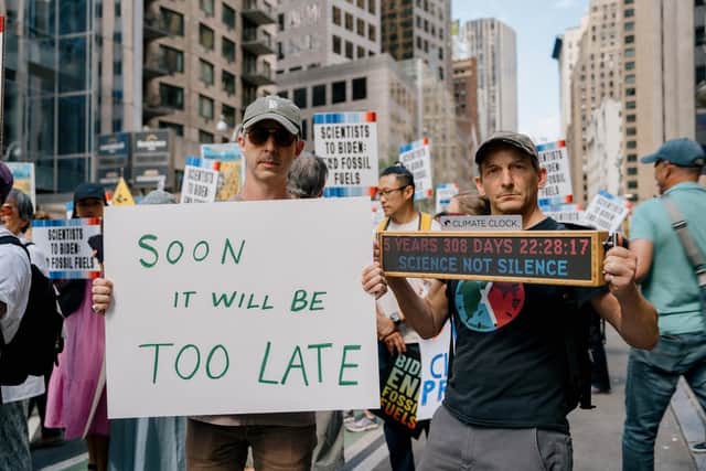 Succession star Jeremy Strong and Climate Clock co-creator Andrew Boyd take part in the End Fossil Fuels Now march in New York as Climate Week began. Picture: Raul de Lima