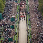 The Ceremonial Procession of the coffin of Queen Elizabeth II travels down the Long Walk as it arrives at Windsor Castle for the Committal Service at St George's Chapel. Picture date: Monday September 19, 2022.