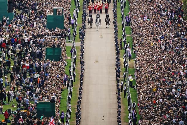 The Ceremonial Procession of the coffin of Queen Elizabeth II travels down the Long Walk as it arrives at Windsor Castle for the Committal Service at St George's Chapel. Picture date: Monday September 19, 2022.