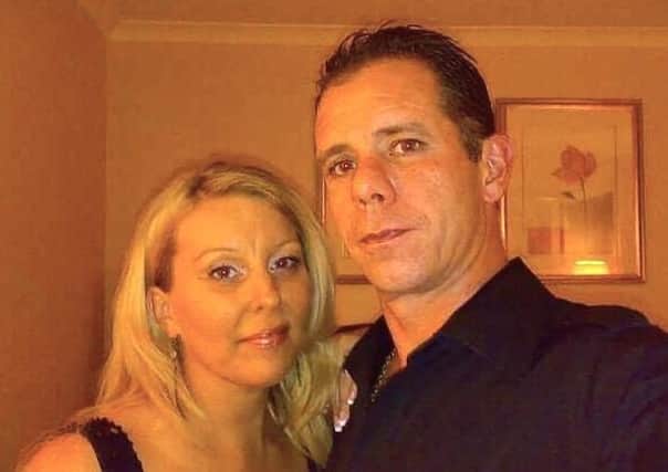 The death of Alison McLaughlin, 53, is being treated as murder while the death of her 57-year-old husband Neil was not suspicious