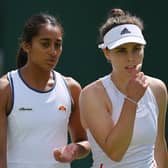 Maia Lumsden, right, with her doubles partner, Naiktha Bains. (Photo by Justin Setterfield/Getty Images)