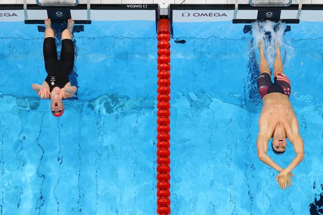 Kathleen Dawson of Team Great Britain who slipped as she competed seen next to Ryan Murphy of Team United Statesin the Mixed 4 x 100m Medley Relay Final at Tokyo Aquatics Centre. Photo by Rob Carr/Getty