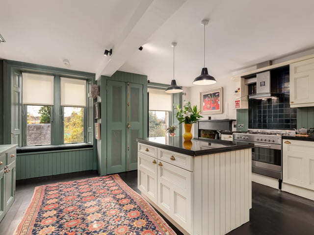 Exterior: The property is part of a sandstone terrace set back from the main road, with steps and an impressive portico.
Contact: Savills