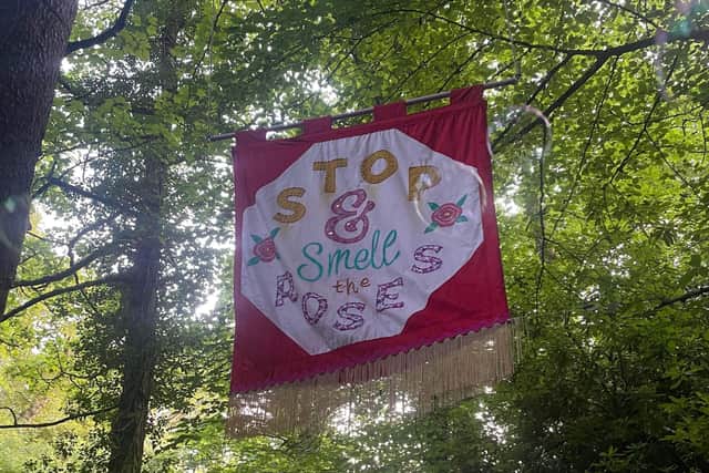 A banner in the trees at Kelburn Garden Party, Kelburn Estate Fairlie, North Ayrshire. Pic: S Christie