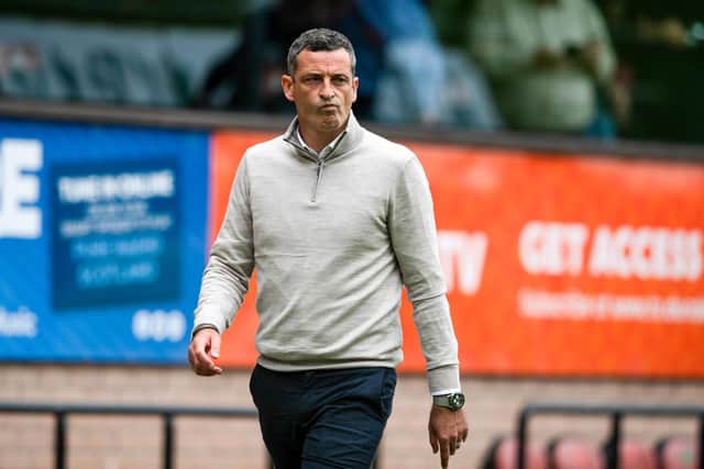 Dundee United manager Jack Ross trudges down the Tannadice touchline after the 9-0 defeat to Celtic. (Photo by Paul Devlin / SNS Group)