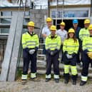 Volunteers from SSEN Transmission and the local community outside the Bothie ahead of the clear-up.