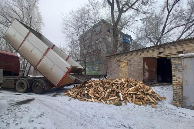 The wood is delivered in a tipper truck.