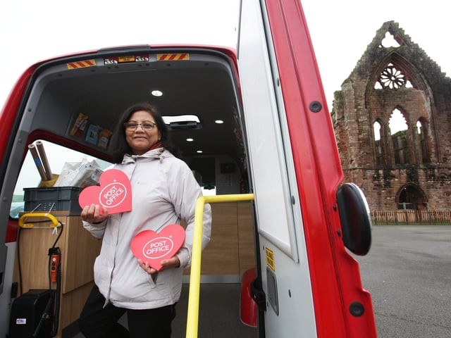Post Office Mobile Branch Manager, Rekha Patel awaits customers outside Sweetheart Abbey, near Dumfries, ahead of Valentine's Day 2019.
