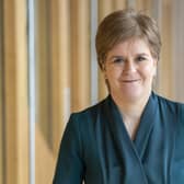 First Minister Nicola Sturgeon arrives ahead of First Minster's Questions (FMQ's) in the main chamber of the Scottish Parliament in Edinburgh.