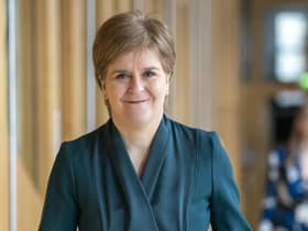 First Minister Nicola Sturgeon arrives ahead of First Minster's Questions (FMQ's) in the main chamber of the Scottish Parliament in Edinburgh.