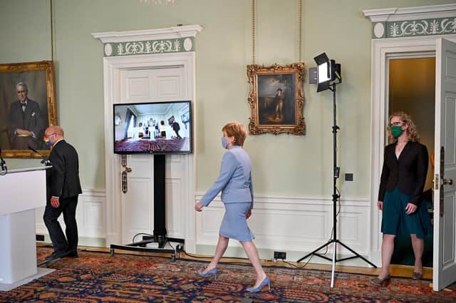 Nicola Sturgeon, Patrick Harvie and Lorna Slater arrive at a press briefing to discuss a new power-sharing partnership between SNP and Scottish Greens last year (Picture: Jeff J Mitchell/pool/Getty Images)