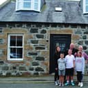 Owners Kelly and Scott Sinclair and their four children