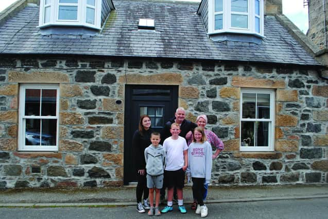 Owners Kelly and Scott Sinclair and their four children