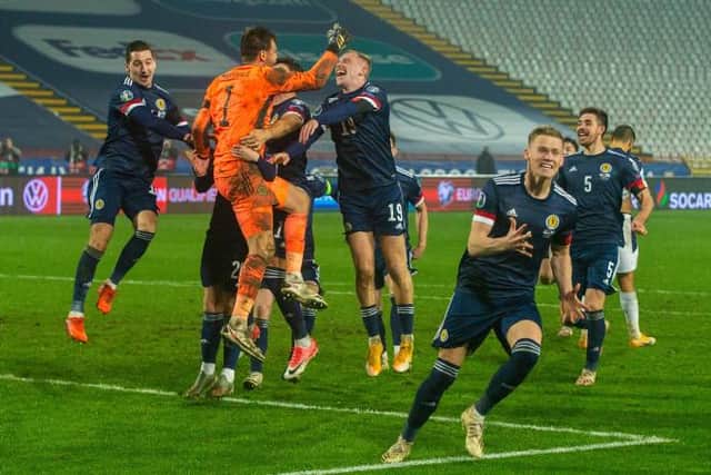 Scotland's players celebrate after David Marshall saves Aleksandar Mitrović's celebration during the UEFA Euro 2020 Qualifier between Serbia and Scotland at the Stadion Rajko Mitic on November 12, 2020, in Belgrade, Serbia. (Photo by Nikola Krstic / SNS Group)