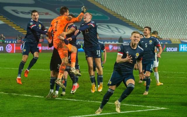 Scotland's players celebrate after David Marshall saves Aleksandar Mitrović's celebration during the UEFA Euro 2020 Qualifier between Serbia and Scotland at the Stadion Rajko Mitic on November 12, 2020, in Belgrade, Serbia. (Photo by Nikola Krstic / SNS Group)