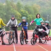 Lee Craigie, second left, visiting Forth Environment Link's Bike Buddies training scheme. (Photo by Forth Environment Link)